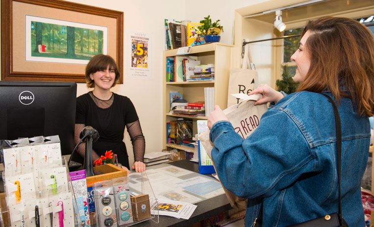 Exchange at the Front Counter of a Local Business